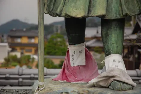 Pious statues punctuate the O-Henro, pilgrimage route of Shikoku Island