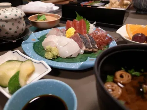 A Japanese meal featuring sashimi