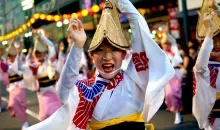 Awa Odori dancer of the festival (Tokushima), wearing the traditional hat amigasa.